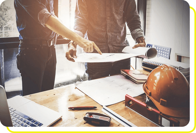 Two Architect man working with compasses and blueprints for architectural plan,engineer sketching a construction project concept.